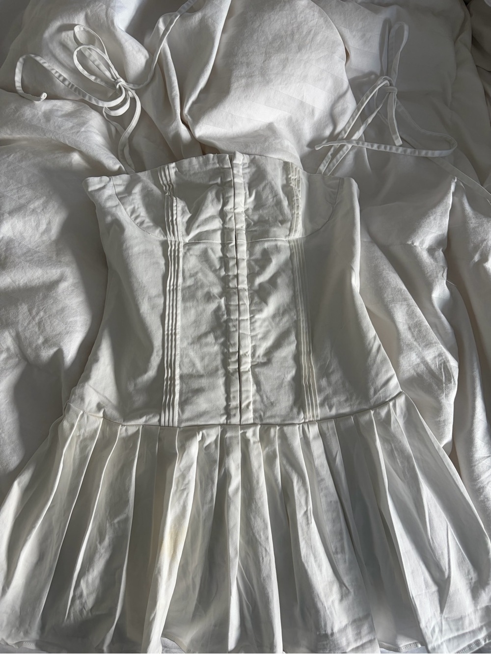 Edikted White Mini Dress with Pleated Skirt